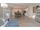 Open concept kitchen and dining area featuring modern appliances and stylish furniture at 11663 Winnower, Noblesville, IN 46060