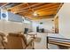 Unfinished basement featuring an exposed ceiling, a drop cloth, and a concrete foundation at 1439 E Mckenzie Rd, Greenfield, IN 46140