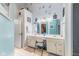 A dual sink bathroom, bright vanity, and walk-in closet at 1439 E Mckenzie Rd, Greenfield, IN 46140