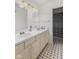 Bathroom featuring a double sink vanity, ample counter space, and shower at 1439 E Mckenzie Rd, Greenfield, IN 46140