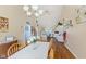Open kitchen and dining area with hardwood floors and natural lighting at 1439 E Mckenzie Rd, Greenfield, IN 46140