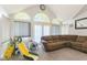 Open living room with vaulted ceiling, arched windows, and plenty of natural light at 1439 E Mckenzie Rd, Greenfield, IN 46140