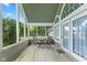 Covered porch featuring chairs, table, and a view of backyard at 1439 E Mckenzie Rd, Greenfield, IN 46140