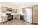 Kitchen area with ample cabinetry and stainless steel refrigerator at 1540 Brook Pointe Dr, Indianapolis, IN 46234