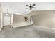 Cozy living area offers neutral paint, view to kitchen, and lots of natural light at 1540 Brook Pointe Dr, Indianapolis, IN 46234