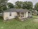 Charming single story home featuring a covered porch and quaint front yard at 1603 S Morgantown Rd, Greenwood, IN 46143