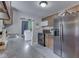 This kitchen has stainless steel appliances, ample storage, and tile flooring at 1603 S Morgantown Rd, Greenwood, IN 46143