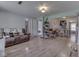 Open-concept living room with sleek floors and neutral wall color at 1603 S Morgantown Rd, Greenwood, IN 46143