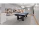 Finished basement with a ping pong table and bar, perfect for recreation and entertainment at 1682 S Fox Cove Blvd, New Palestine, IN 46163