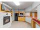 Basement bar area equipped with modern appliances, cabinetry, and countertop space at 1682 S Fox Cove Blvd, New Palestine, IN 46163