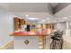 Basement with kitchen and bar, offering a perfect blend of entertainment and functionality at 1682 S Fox Cove Blvd, New Palestine, IN 46163