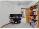 Finished basement office area with built-in desk, storage, and access to additional living space at 1682 S Fox Cove Blvd, New Palestine, IN 46163