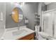 Updated bathroom with vanity, modern fixtures and shower at 1682 S Fox Cove Blvd, New Palestine, IN 46163