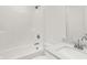 Bright, minimalist bathroom featuring a tub-shower combination and a quartz vanity at 16929 Sandhurst Pl, Westfield, IN 46074