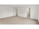 Bright bedroom with a door leading to the bathroom and carpeted floors at 16929 Sandhurst Pl, Westfield, IN 46074