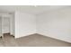 An empty bedroom with an open doorway to a closet and door to the bathroom, ready for your personal design at 16929 Sandhurst Pl, Westfield, IN 46074