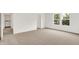 Bright bedroom with a view of a window and carpeted floors at 16929 Sandhurst Pl, Westfield, IN 46074