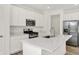 Bright kitchen with stainless steel appliances, gas range, island sink, and plenty of counter space at 16929 Sandhurst Pl, Westfield, IN 46074
