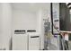 This utility room features a washer, dryer, and water heater at 16929 Sandhurst Pl, Westfield, IN 46074