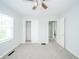 This bedroom features neutral colored walls, carpeted floors, and a closet for plenty of storage space at 171 Nursery Rd, Anderson, IN 46012