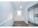 Bright dining area with built-in cabinetry, new flooring, and a stylish light fixture at 171 Nursery Rd, Anderson, IN 46012