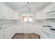 Efficient kitchen with white cabinets and countertops, and modern appliances at 171 Nursery Rd, Anderson, IN 46012