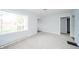 Light-filled living room with new carpeting, and an open layout at 171 Nursery Rd, Anderson, IN 46012