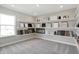 Bright showroom displaying various tiling, wood flooring and carpet samples in a well-lit, neutral color palette at 19780 Moorpark Lndg, Noblesville, IN 46062