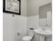 Clean, bright half bathroom with subway tile, pedestal sink, and modern fixtures at 19838 Moorpark Lndg, Noblesville, IN 46062