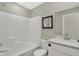 Bathroom featuring tile floors, neutral walls, shower/tub combo, and vanity sink at 19838 Moorpark Lndg, Noblesville, IN 46062