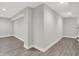 Spacious finished basement with luxury vinyl plank flooring and recessed lighting at 2008 Yandes St, Indianapolis, IN 46202