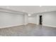 Finished basement with recessed lighting and space for entertaining or recreation at 2008 Yandes St, Indianapolis, IN 46202