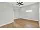 Bedroom features hardwood floors and a ceiling fan at 2008 Yandes St, Indianapolis, IN 46202