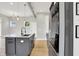 Open concept kitchen with center island, modern lighting, and stainless steel appliances at 2008 Yandes St, Indianapolis, IN 46202