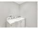 A laundry room featuring a modern washing machine and dryer at 2008 Yandes St, Indianapolis, IN 46202