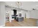 Bright, open-concept living space featuring hardwood floors and modern lighting fixtures at 2008 Yandes St, Indianapolis, IN 46202