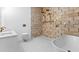 Modern bathroom featuring double shower heads, luxurious tub and white fixtures at 206 N Beville Ave, Indianapolis, IN 46201