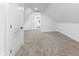 Bonus room with sloped ceilings, carpeted floors and white walls at 206 N Beville Ave, Indianapolis, IN 46201