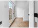 Entryway featuring herringbone floors and a door to the back yard at 206 N Beville Ave, Indianapolis, IN 46201