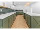 Well-lit kitchen with stainless steel appliances, a large island, and modern finishes at 206 N Beville Ave, Indianapolis, IN 46201