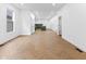 Bright, open-concept living space with hardwood floors and ample natural light at 206 N Beville Ave, Indianapolis, IN 46201