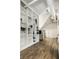 Bonus room with hardwood floors, built-in bookcase, and pitched ceiling at 214 E St Joseph St, Indianapolis, IN 46202