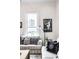 Living room with large windows, modern lamp, and contemporary decor at 214 E St Joseph St, Indianapolis, IN 46202