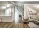 Bonus room with hardwood floors, built-in bookcase, and pitched ceiling at 214 E St Joseph St, Indianapolis, IN 46202