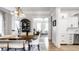 Open concept dining area leading into a bright and modern kitchen at 214 E St Joseph St, Indianapolis, IN 46202