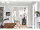 Spacious dining area that transitions into a contemporary kitchen with bar seating at 214 E St Joseph St, Indianapolis, IN 46202