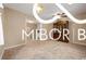 The living room features neutral paint, and the original hardwood floors, in a sunlit space at 2410 S Ebright St, Muncie, IN 47302