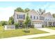 Charming two-story home featuring a well-manicured lawn and attached two-car garage at 265 Gathering Ln, Greenwood, IN 46143