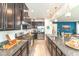 Modern kitchen with granite countertops, stainless steel appliances, and stylish cabinetry at 265 Gathering Ln, Greenwood, IN 46143