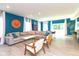Stylish living room featuring an oversized sofa and bright blue accent wall at 265 Gathering Ln, Greenwood, IN 46143